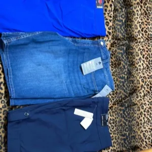 3 pairs size 22 shorts. 1 Lee rider Bermuda, 1 briggs french blue; 1 Napa Valley