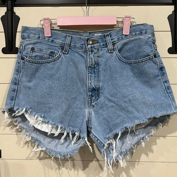 Distressed hem denim shirts. Size 32. Waist flat 16”