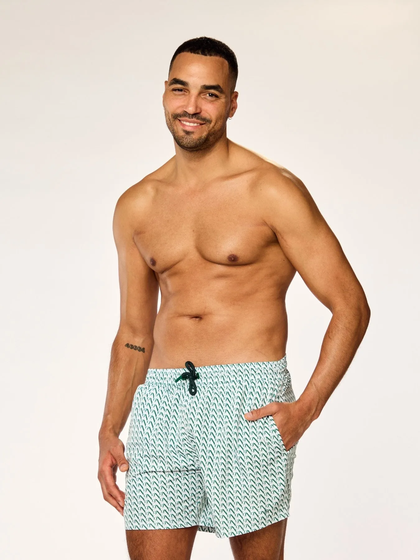 EOS - Swim Shorts • Dark Green Monogram