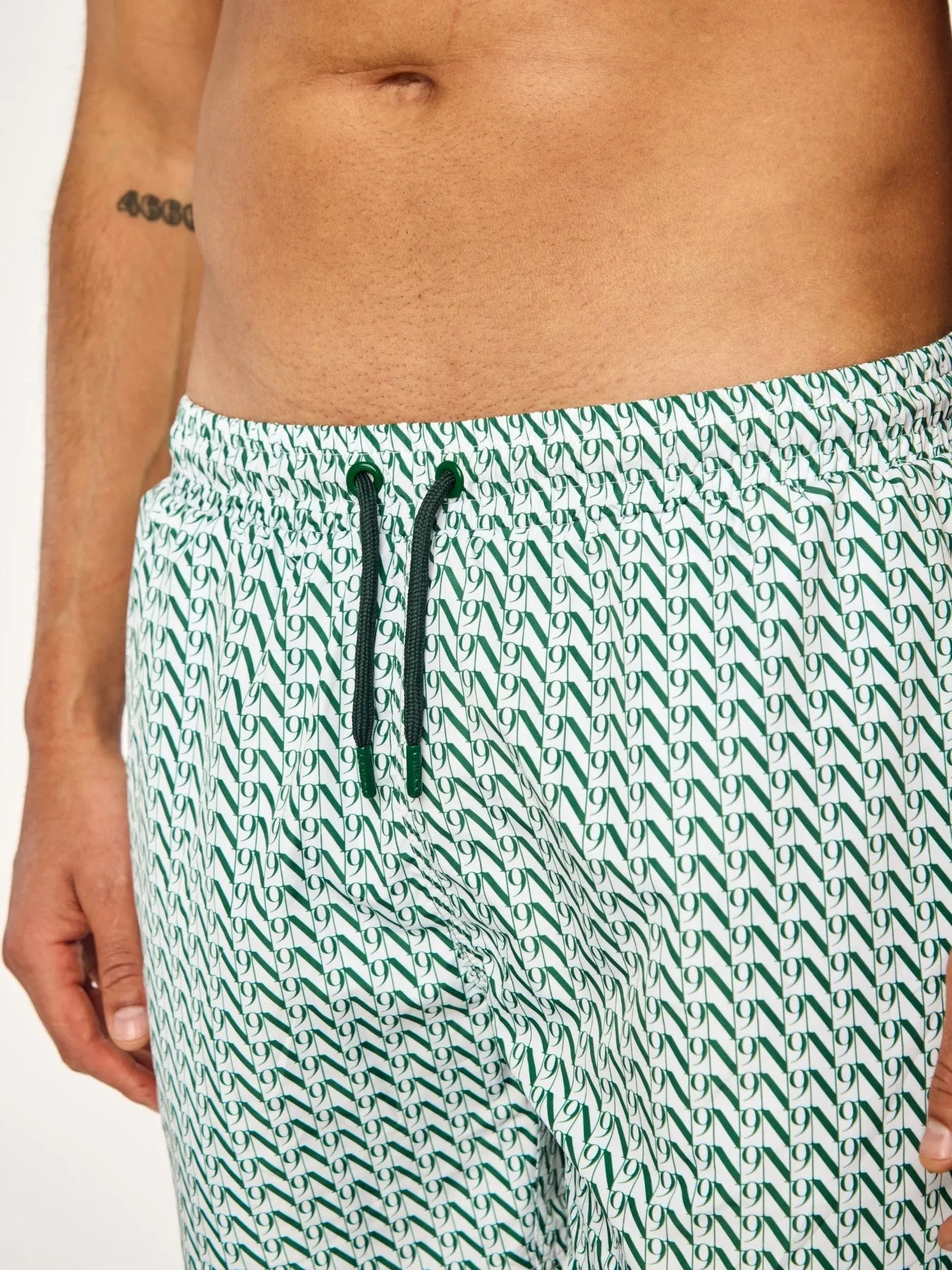 EOS - Swim Shorts • Dark Green Monogram