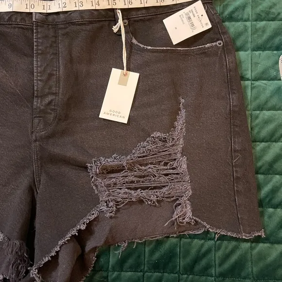 Good American Black denim bombshell shorts