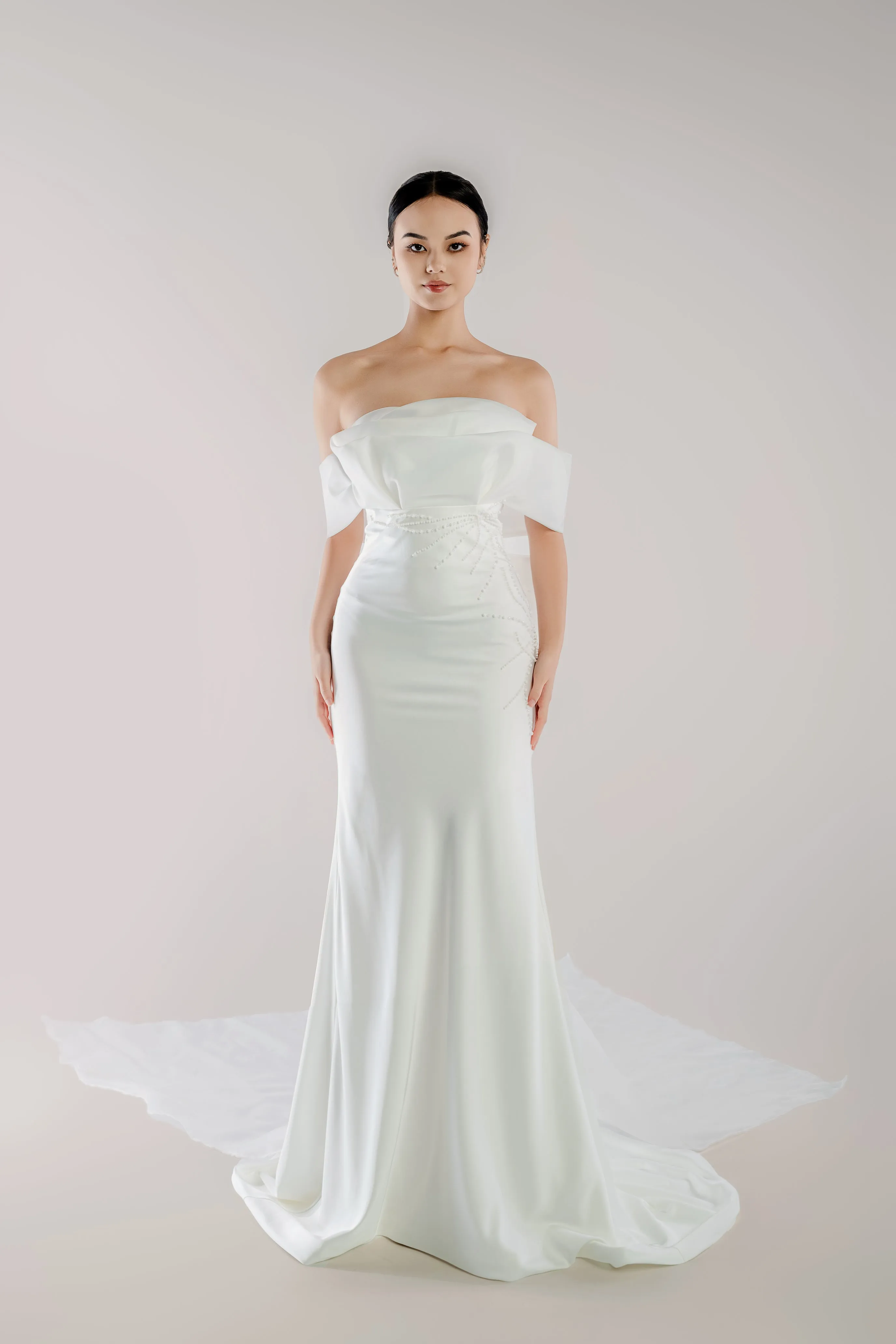 WL Bridal & Gown – Arwyn · Off-Shoulder Fit and Flare Wedding Dress with 3D Beading & Bow Train