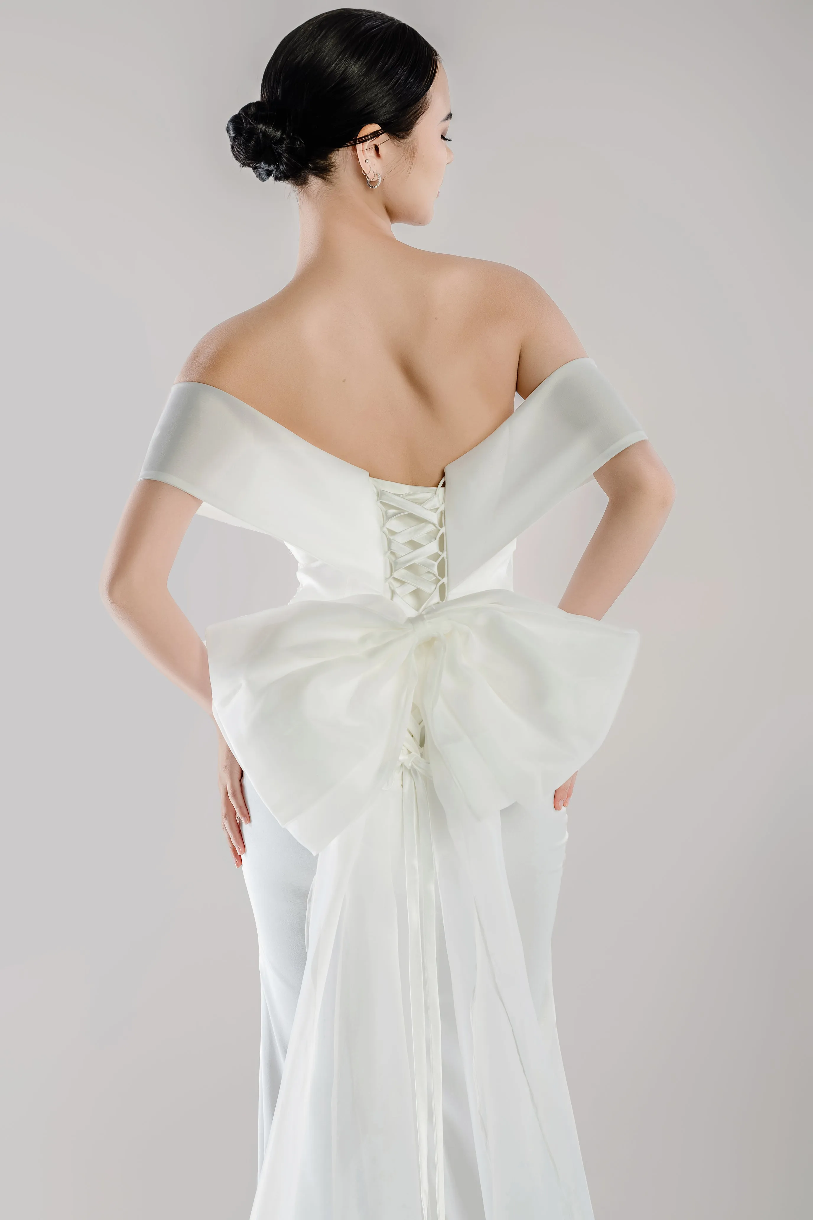 WL Bridal & Gown – Arwyn · Off-Shoulder Fit and Flare Wedding Dress with 3D Beading & Bow Train