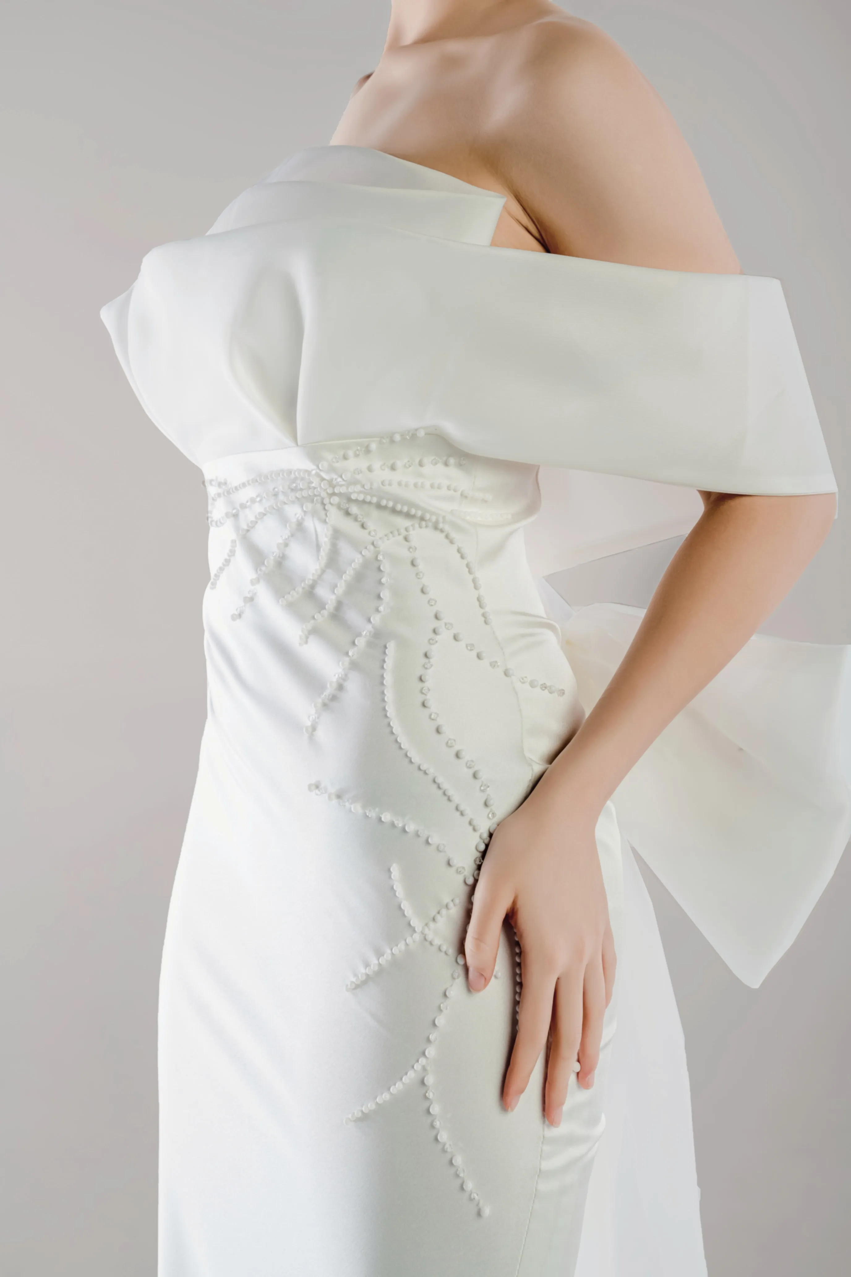 WL Bridal & Gown – Arwyn · Off-Shoulder Fit and Flare Wedding Dress with 3D Beading & Bow Train